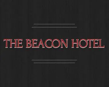 A black background with the words " the beacon hotel ".